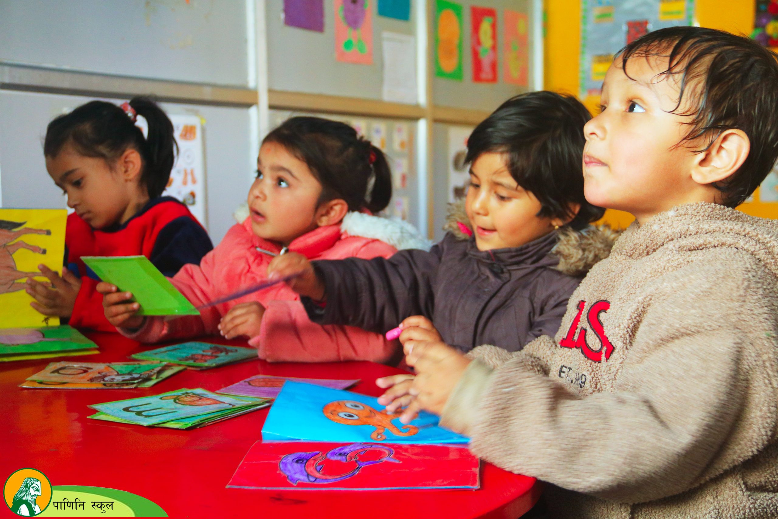 Children working with Montessori materials in classroom