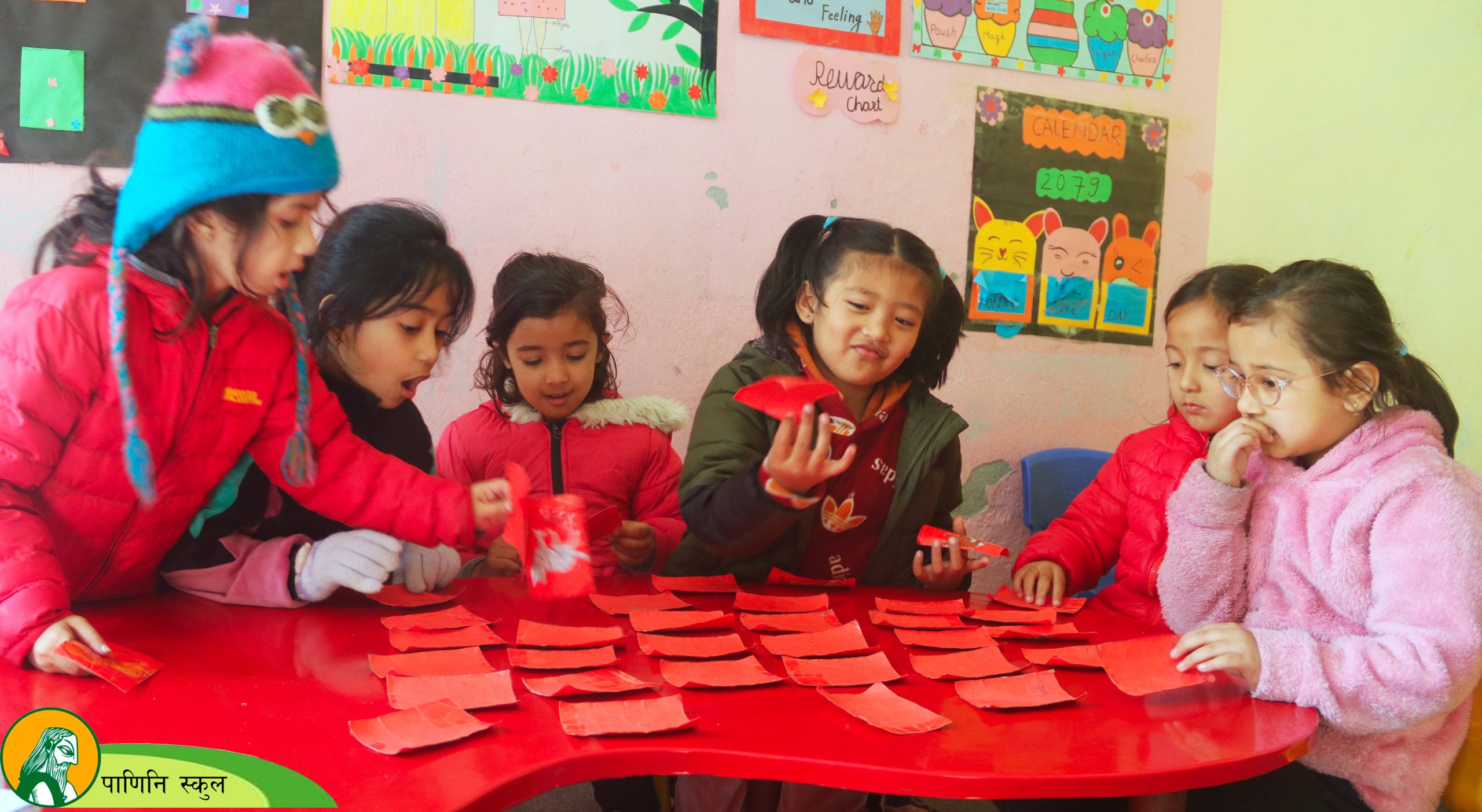 Child reading and exploring books at Panini Montessori